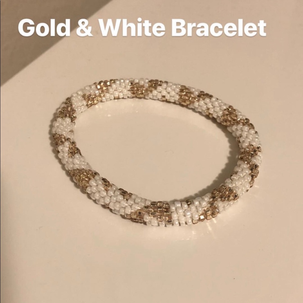 Gold and white bracelet